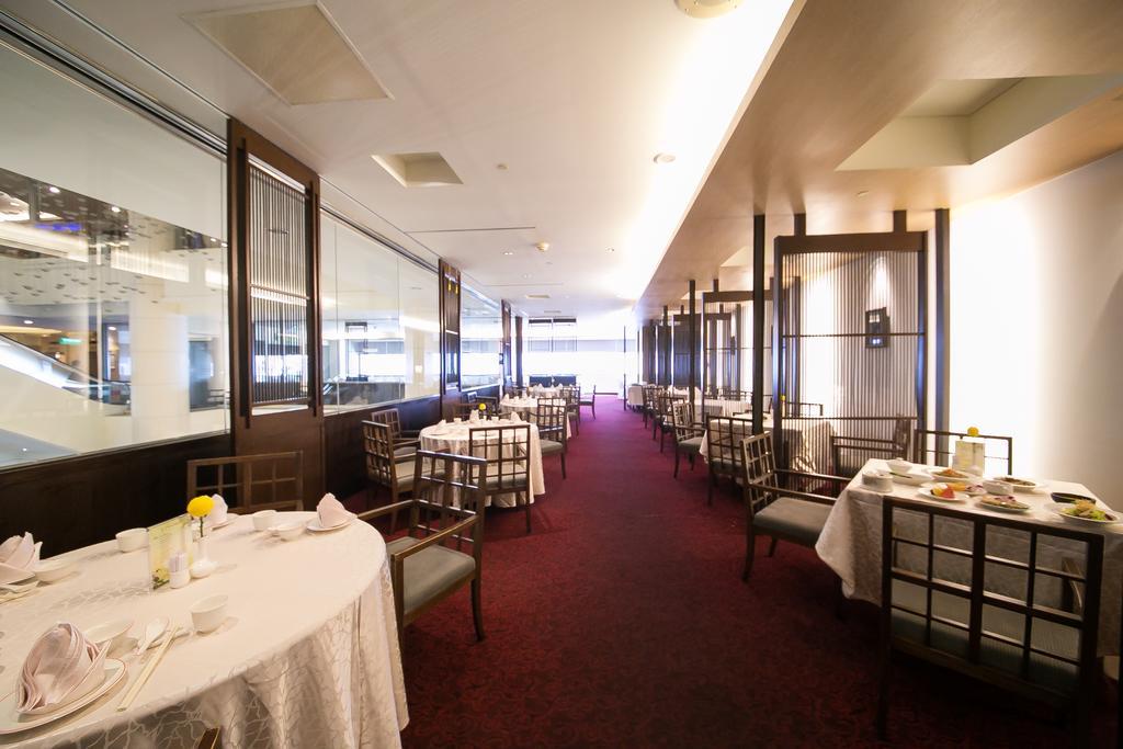 Evergreen Plaza Hotel - Тайнань Экстерьер фото Interior of the restaurant